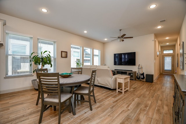 2543 Summer Peach St, Katy, TX 77494 - dining area featuring light wood-style flooring, recessed lighting, plenty of natural light, a ceiling fan, and baseboards