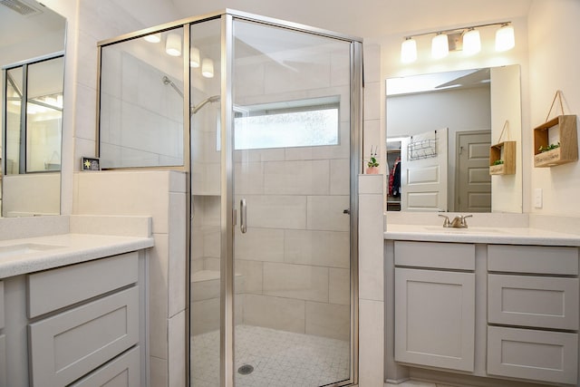 2543 Summer Peach St, Katy, TX 77494 - full bathroom with a shower stall and two vanities