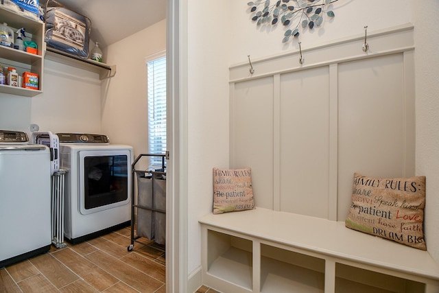 2543 Summer Peach St, Katy, TX 77494 - clothes washing area featuring washer and clothes dryer and wood finished floors