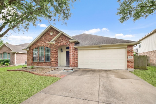 13614 Brighton Park Dr, Houston, TX 77044 - traditional-style home featuring brick siding, driveway, a garage, and roof with shingles