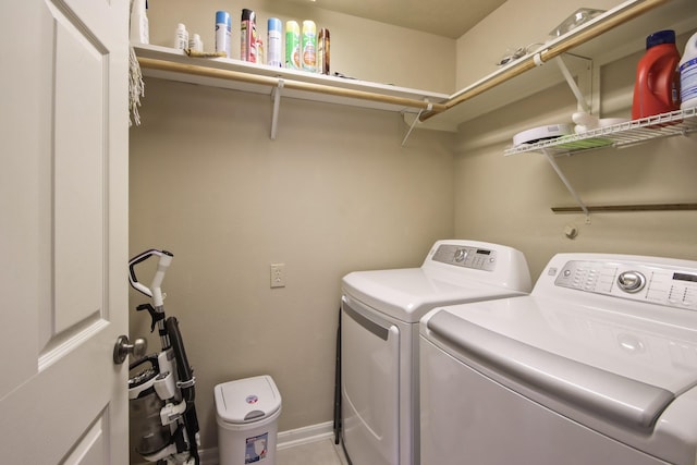 13614 Brighton Park Dr, Houston, TX 77044 - washroom with independent washer and dryer