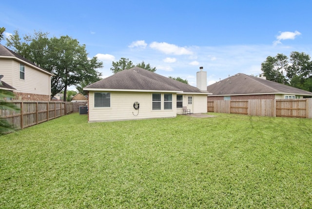 13614 Brighton Park Dr, Houston, TX 77044 - back of house with a chimney