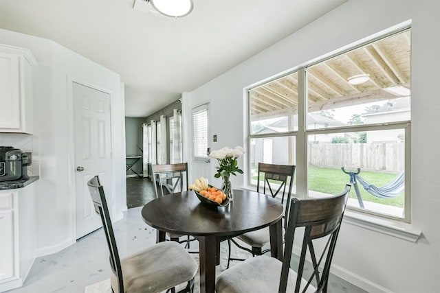 dining space with baseboards
