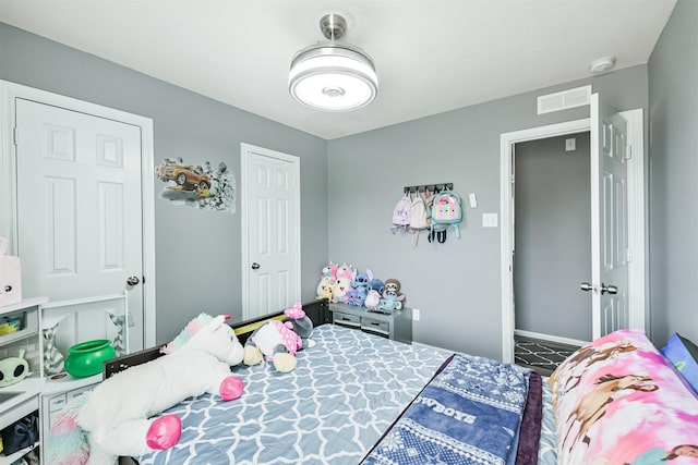 bedroom featuring baseboards
