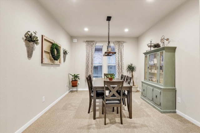 2321 Vineyard Terrace Ln, League City, TX 77573 - dining room featuring a chandelier, light colored carpet, baseboards, and recessed lighting