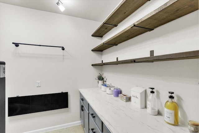 2321 Vineyard Terrace Ln, League City, TX 77573 - laundry room featuring baseboards