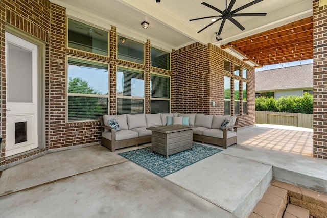 view of patio / terrace with an outdoor living space and ceiling fan