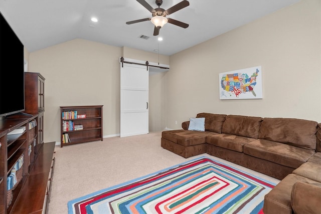 carpeted living room featuring a barn door, a ceiling fan, recessed lighting, and lofted ceiling