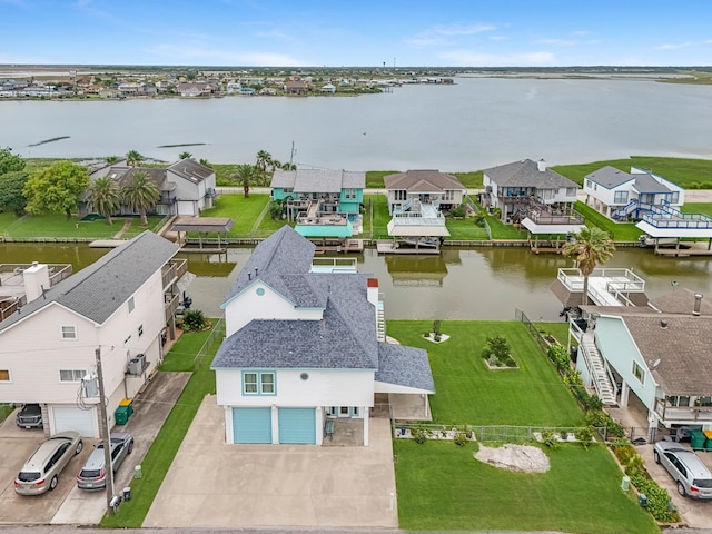 7 N Flamingo St, La Marque, TX 77568 - aerial view of residential area featuring a large body of water