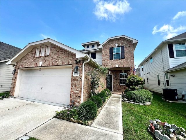 13842 Evansdale Ln, Houston, TX 77083 - traditional home with brick siding, a garage, driveway, and a front lawn