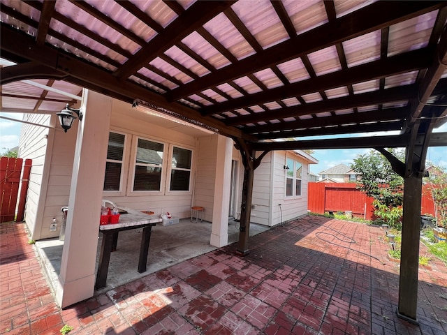 13842 Evansdale Ln, Houston, TX 77083 - view of patio / terrace with fence and a pergola