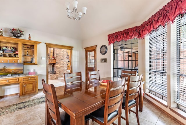 6319 Wimbledon Villas Dr, Spring, TX 77379 - dining space featuring a chandelier and plenty of natural light