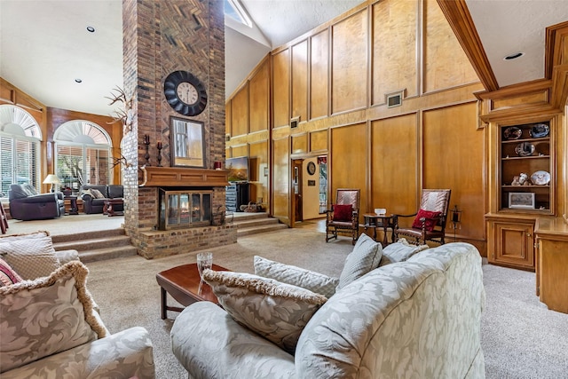 6319 Wimbledon Villas Dr, Spring, TX 77379 - living room with light colored carpet, a towering ceiling, a fireplace, and wooden walls