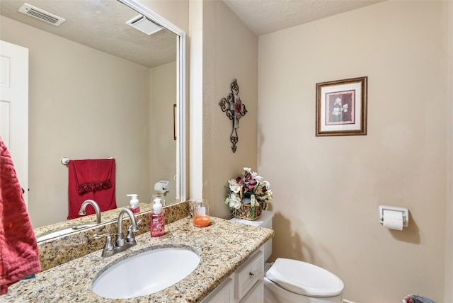 6319 Wimbledon Villas Dr, Spring, TX 77379 - half bathroom with toilet and vanity