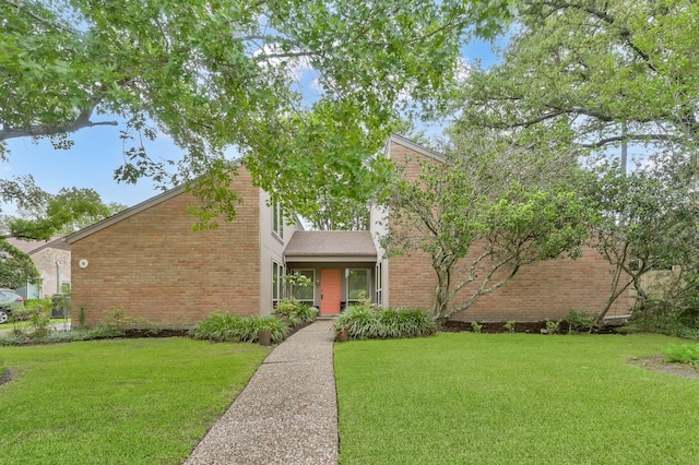 11414 Cedar Creek Dr, Houston, TX 77077 - mid-century inspired home featuring a front yard and brick siding