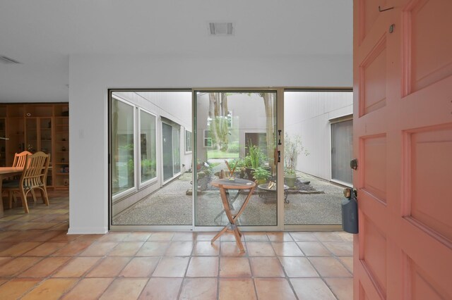 11414 Cedar Creek Dr, Houston, TX 77077 - doorway with light tile patterned floors