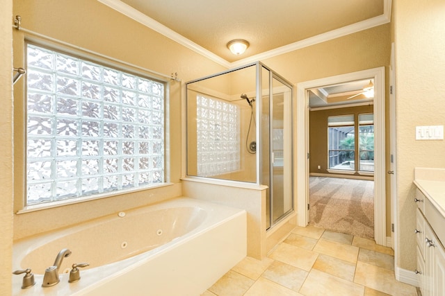 106 Arrowhead Dr, Lake Jackson, TX 77566 - bathroom featuring ornamental molding, a stall shower, vanity, and a tub with jets