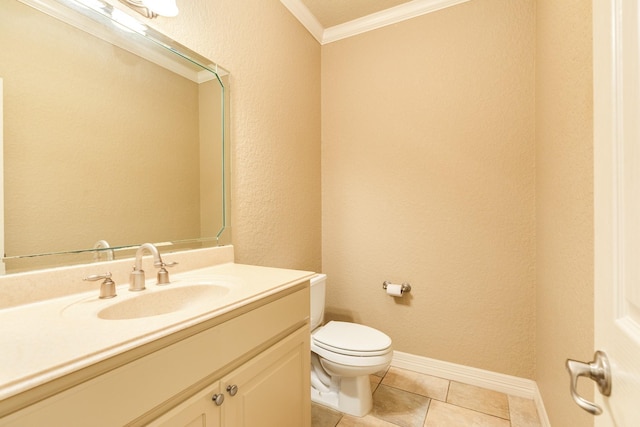 106 Arrowhead Dr, Lake Jackson, TX 77566 - half bathroom with crown molding, toilet, vanity, tile patterned floors, and baseboards
