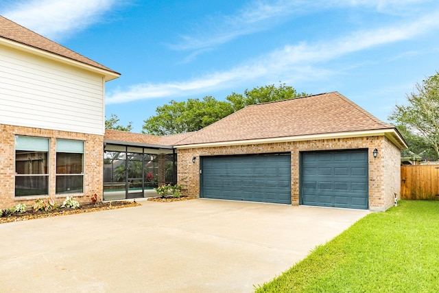 106 Arrowhead Dr, Lake Jackson, TX 77566 - view of front of home featuring brick siding, concrete driveway, an attached garage, and a shingled roof
