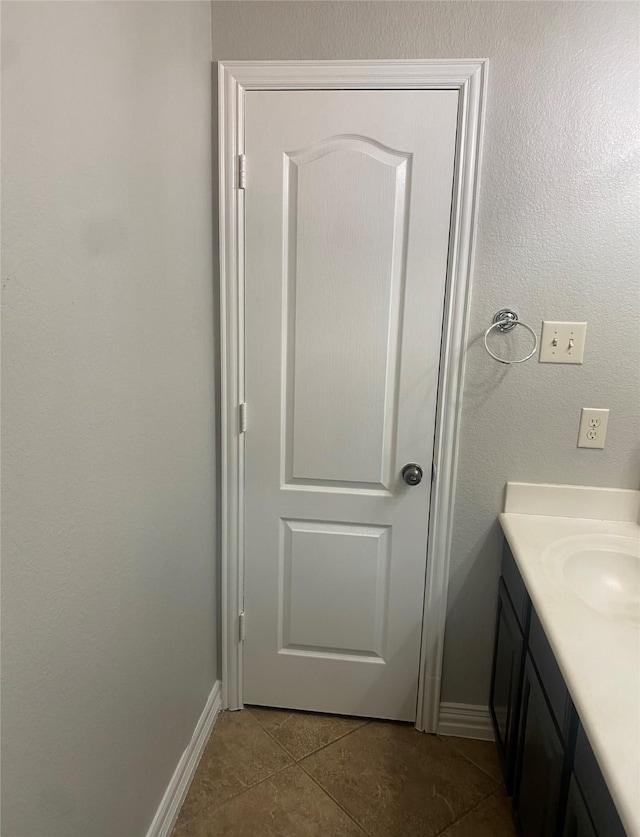 24211 Bella Florence Dr, Richmond, TX 77406 - bathroom featuring tile patterned flooring and vanity