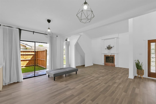10731 Sageberry Dr, Houston, TX 77089 - additional living space with wood finished floors and a fireplace