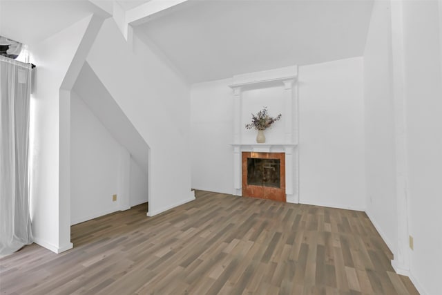 10731 Sageberry Dr, Houston, TX 77089 - unfurnished living room featuring wood finished floors, a fireplace, and baseboards