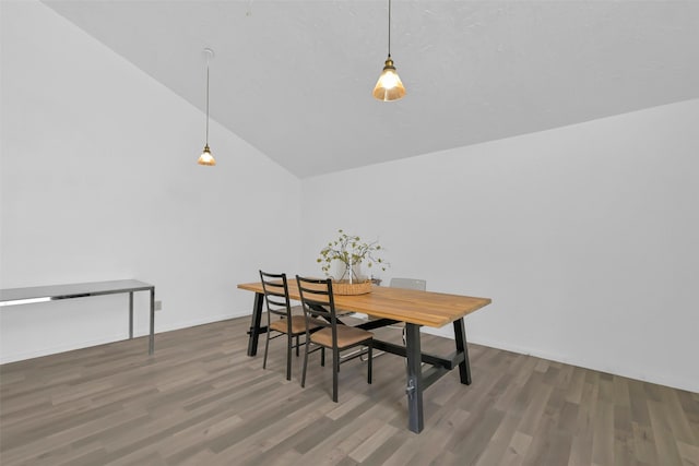 10731 Sageberry Dr, Houston, TX 77089 - dining area with wood finished floors and vaulted ceiling