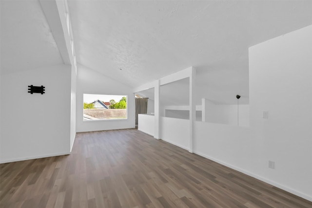 10731 Sageberry Dr, Houston, TX 77089 - additional living space with lofted ceiling, wood finished floors, and baseboards