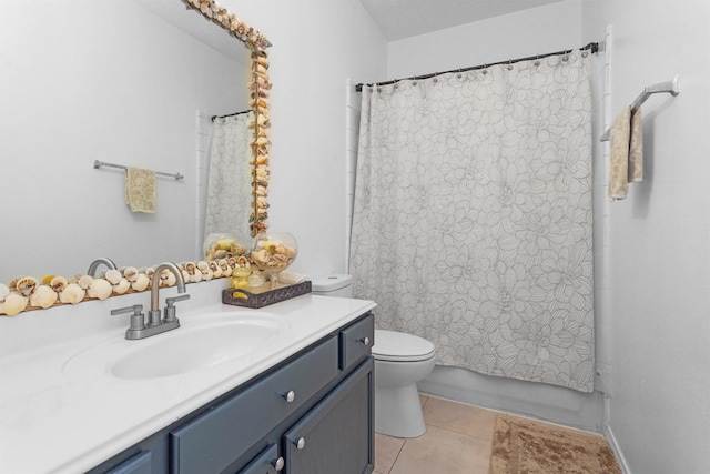 bathroom featuring tile patterned floors, toilet, vanity, and shower / bath combination with curtain