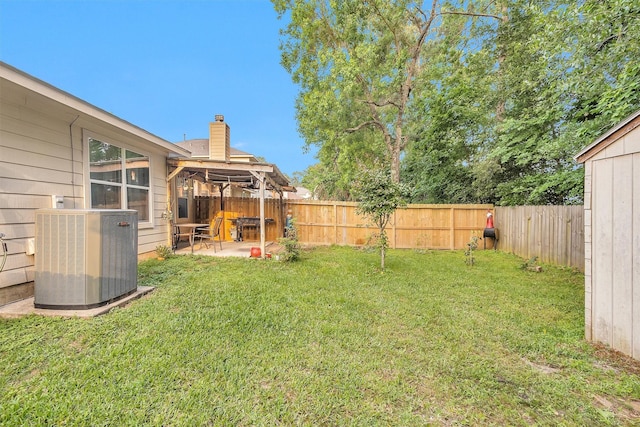 view of yard with cooling unit, a patio area, and a gazebo
