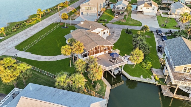 4321 Jolly Roger Rd, Galveston, TX 77554 - aerial perspective of suburban area with a nearby body of water
