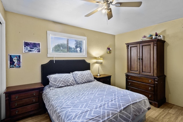 309 Kings Hl, Palacios, TX 77465 - bedroom featuring light wood finished floors and a ceiling fan