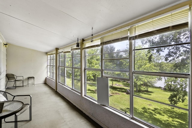 309 Kings Hl, Palacios, TX 77465 - unfurnished sunroom featuring concrete floors