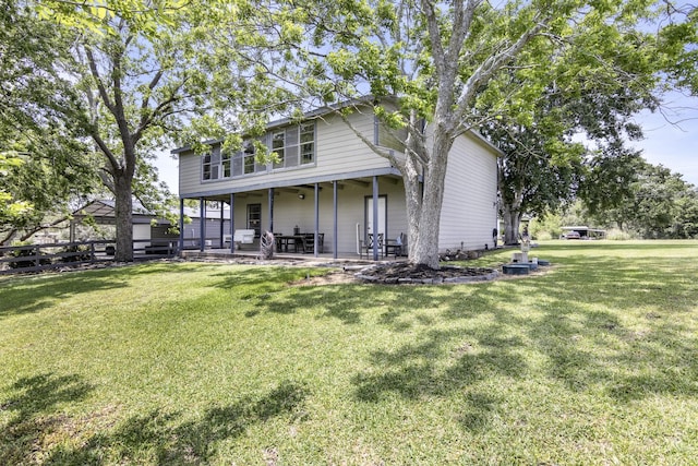 309 Kings Hl, Palacios, TX 77465 - rear view of property with a patio area
