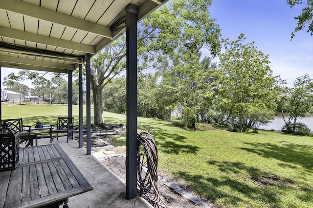 309 Kings Hl, Palacios, TX 77465 - view of green lawn featuring a water view