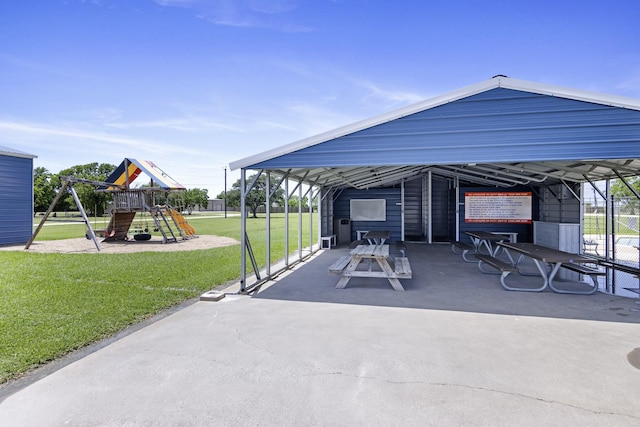 309 Kings Hl, Palacios, TX 77465 - view of patio / terrace with a playground