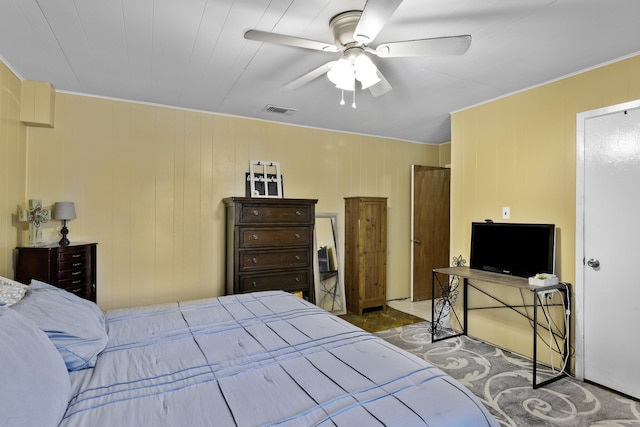 309 Kings Hl, Palacios, TX 77465 - bedroom featuring a ceiling fan and ornamental molding
