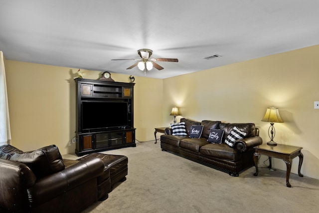 309 Kings Hl, Palacios, TX 77465 - living room with a ceiling fan and light colored carpet