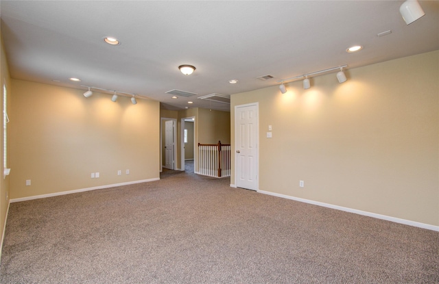 17607 Memorial Falls Dr, Tomball, TX 77375 - carpeted empty room with attic access, rail lighting, baseboards, and recessed lighting