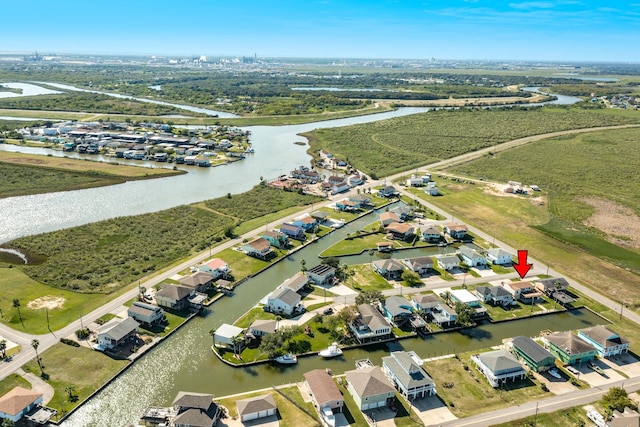 107 Crows Nest Rd, Freeport, TX 77541 - aerial view of property and surrounding area featuring a large body of water and nearby suburban area
