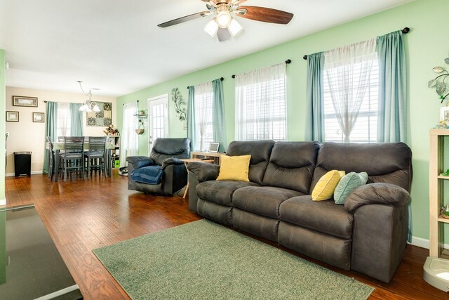 107 Crows Nest Rd, Freeport, TX 77541 - living room with a ceiling fan, wood finished floors, and baseboards