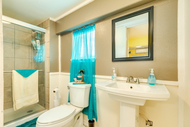 107 Crows Nest Rd, Freeport, TX 77541 - bathroom with a shower stall, toilet, and a sink