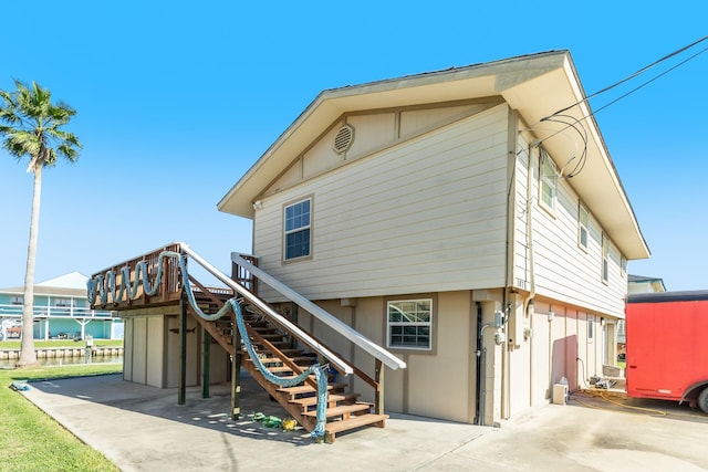 107 Crows Nest Rd, Freeport, TX 77541 - rear view of property featuring stairs