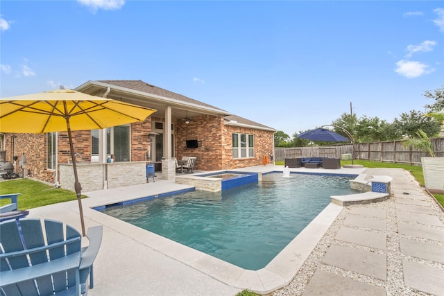 9612 Eden Ridge Ln, Pearland, TX 77584 - view of pool with an outdoor hangout area, a patio, a fenced backyard, and a pool with connected hot tub