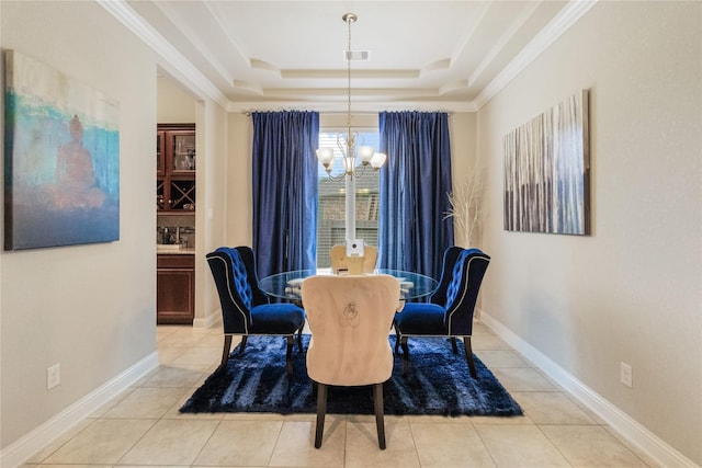 9612 Eden Ridge Ln, Pearland, TX 77584 - dining area featuring a chandelier, a raised ceiling, and light tile patterned floors