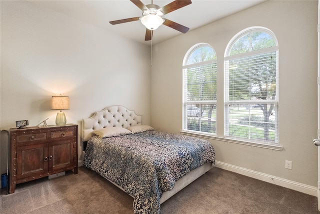 9612 Eden Ridge Ln, Pearland, TX 77584 - bedroom with carpet flooring, baseboards, and a ceiling fan
