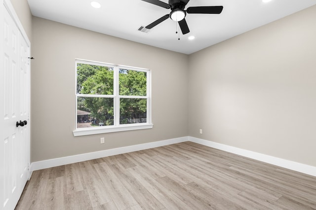 102 Schade Ln, Houston, TX 77037 - empty room featuring light wood finished floors, recessed lighting, baseboards, and a ceiling fan