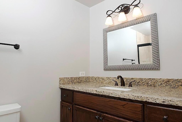 5050 Woodway Dr Unit 2A, Houston, TX 77056 - bathroom featuring toilet and vanity