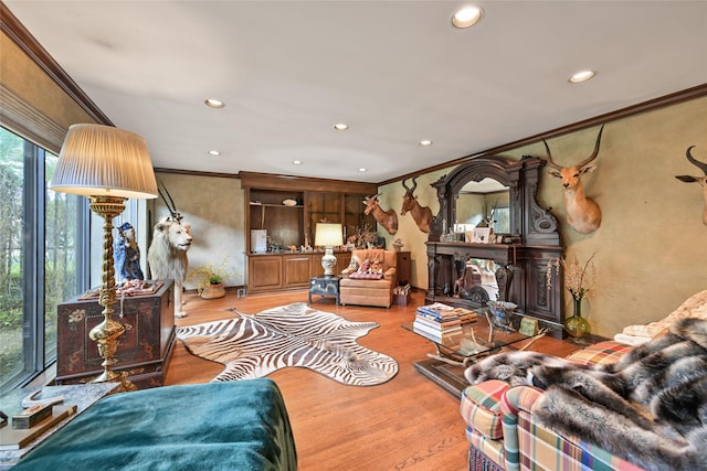 435 Flint Point Dr, Houston, TX 77024 - living room featuring ornamental molding, wood finished floors, and recessed lighting