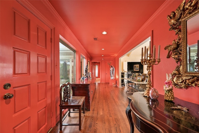 435 Flint Point Dr, Houston, TX 77024 - entrance foyer with wood finished floors, ornamental molding, and recessed lighting